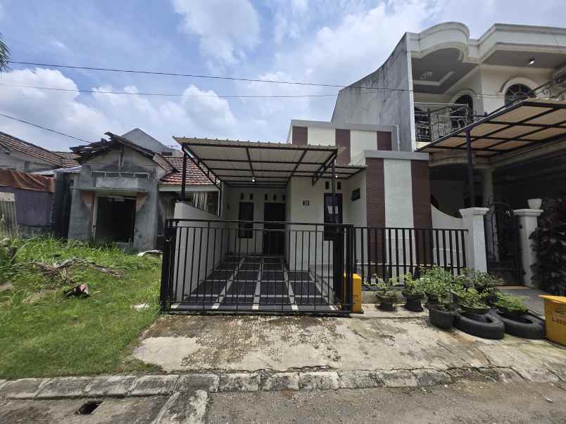 dijual rumah cluster graha indira citra raya tangerang