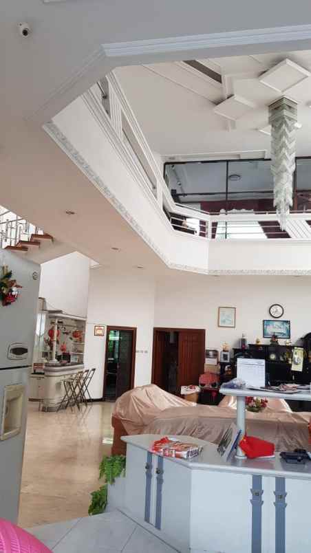 dijual rumah dharmahusada indah