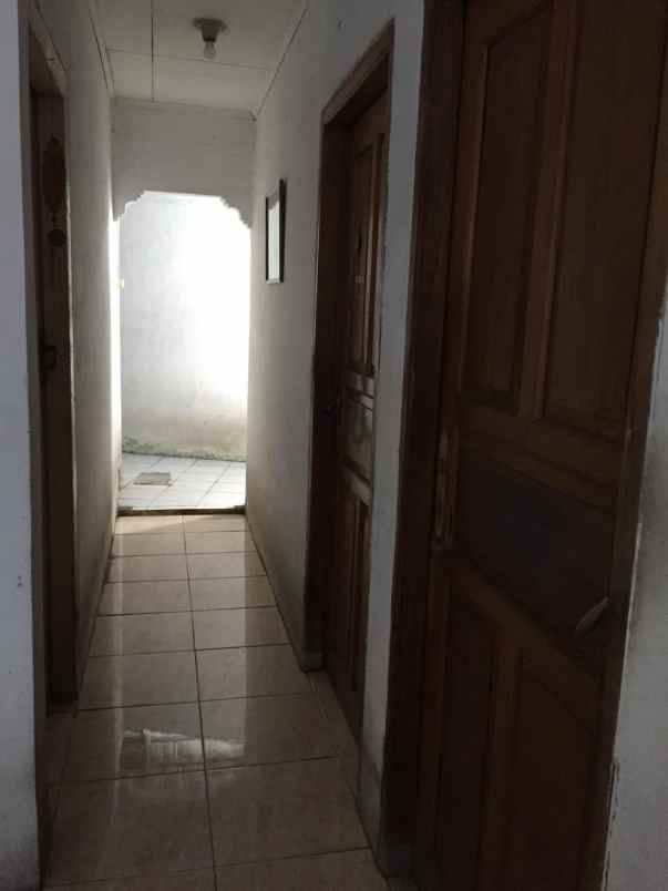 dijual rumah jalan mawar kampung ambon