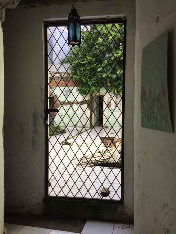 dijual rumah jalan mawar kampung ambon