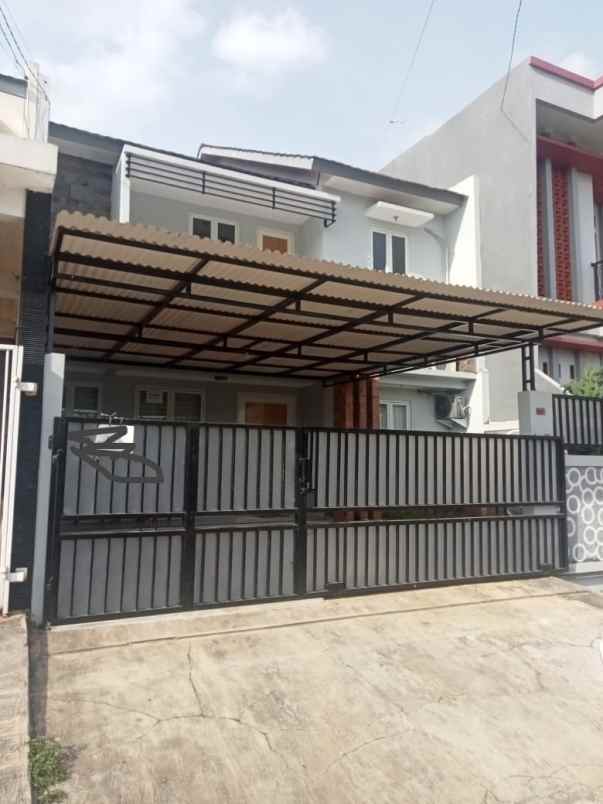 dijual rumah jl pondok kelapa raya