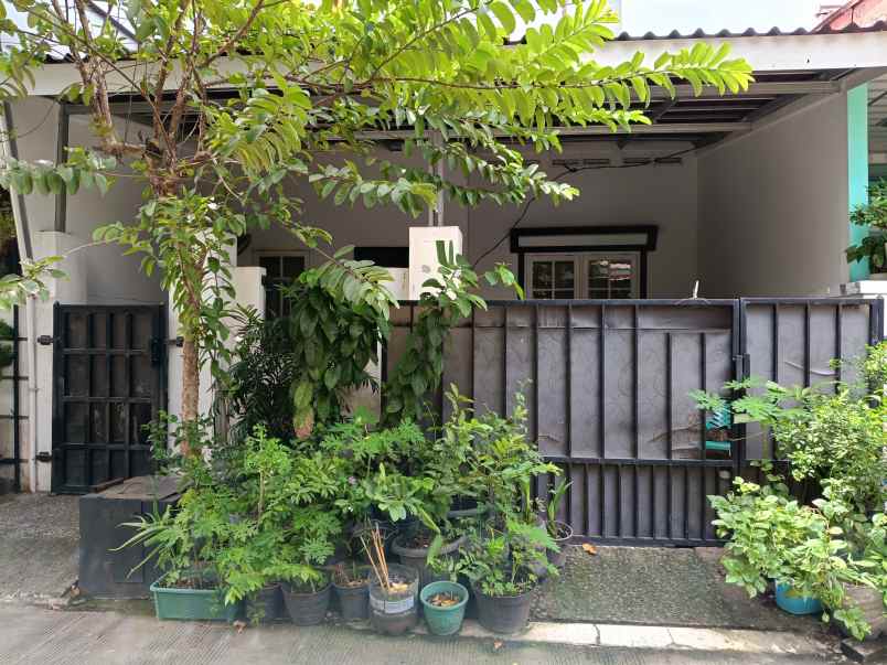 dijual rumah taman harapan baru