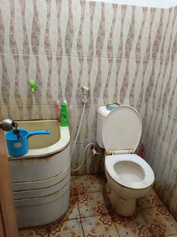 dijual rumah taman harapan baru