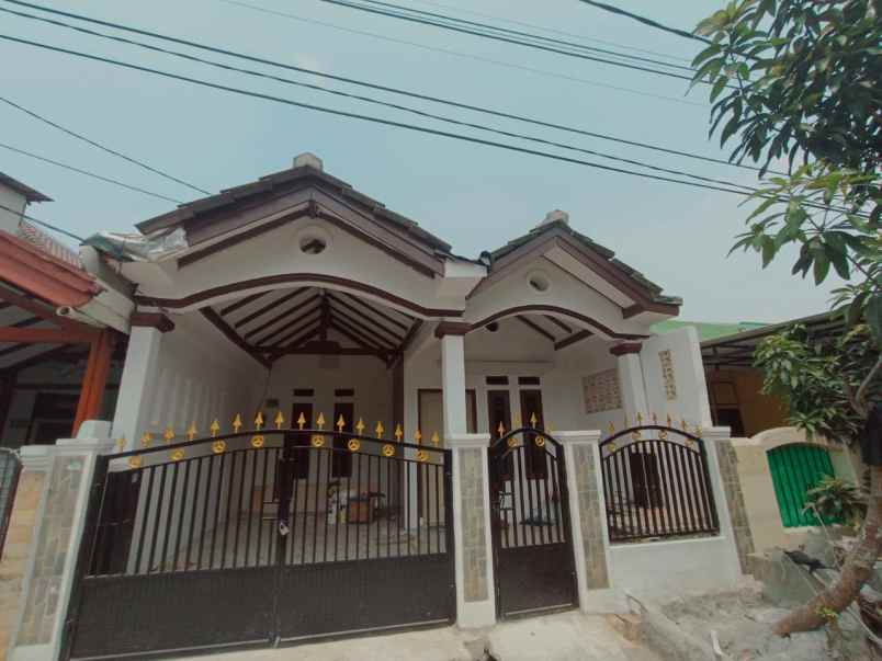 dijual rumah taman harapan baru