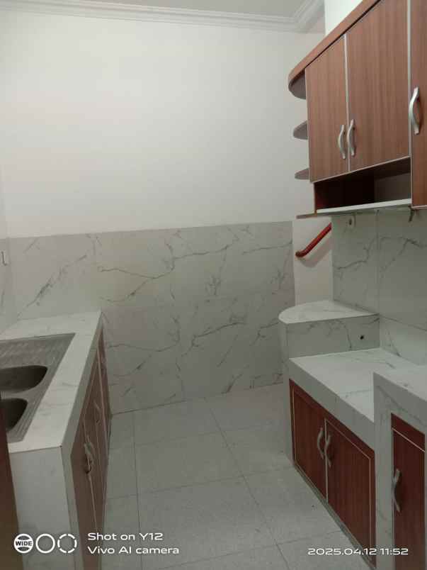 disewakan rumah kayu putih