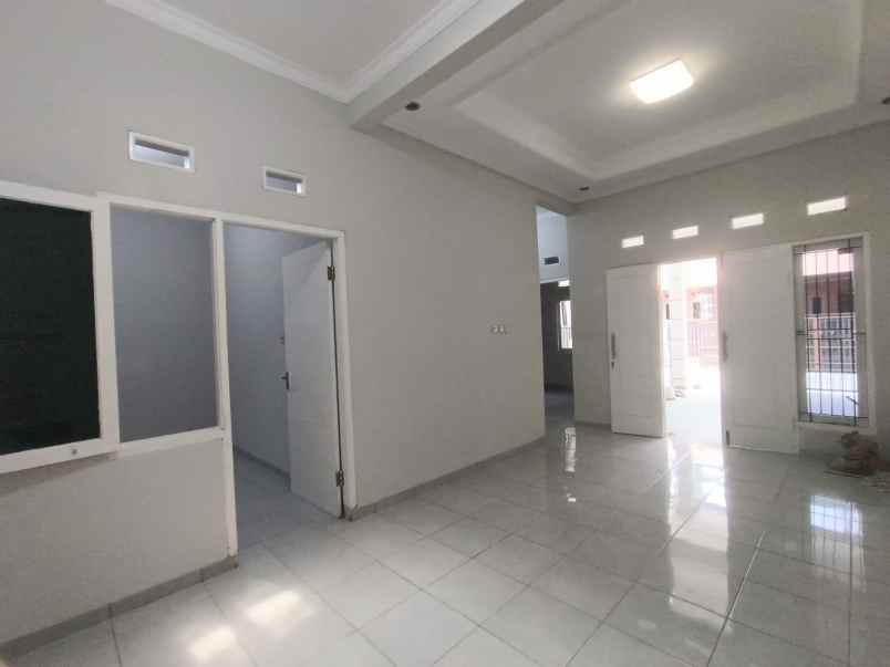 disewakan rumah kota harapan indah bekasi