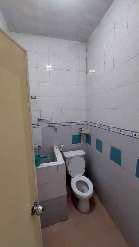 disewakan rumah pantai mentari