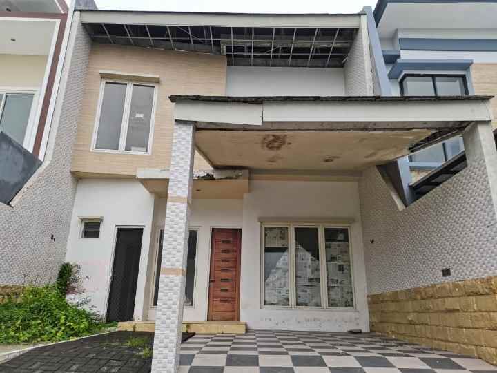 rumah 2 lantai di palm beach pakuwon city