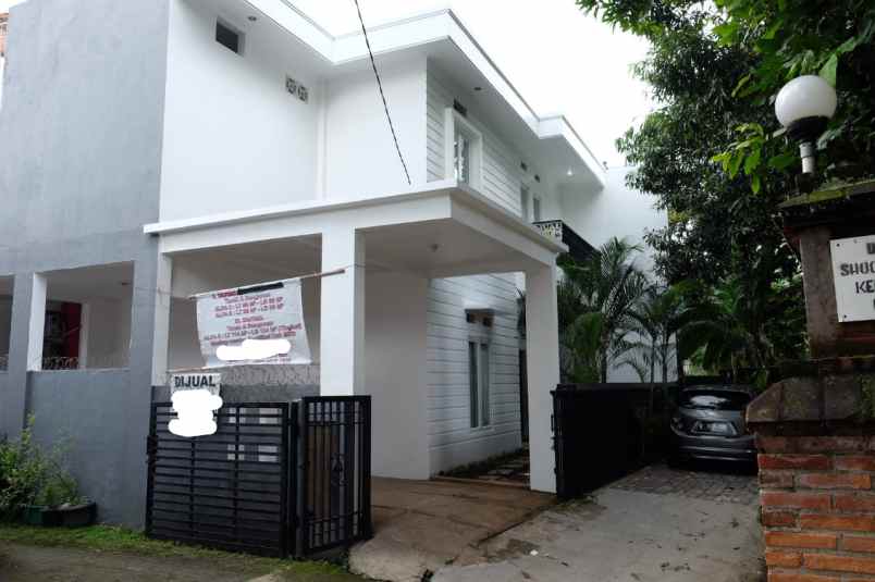 rumah jl putri tunggal