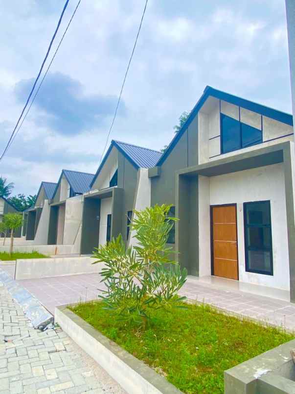 rumah modern asri dan strategis