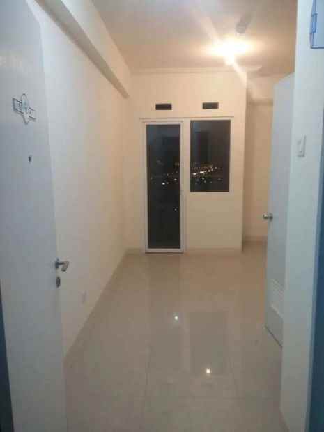 sewa apartemen studio unfurnish di green pramuka city