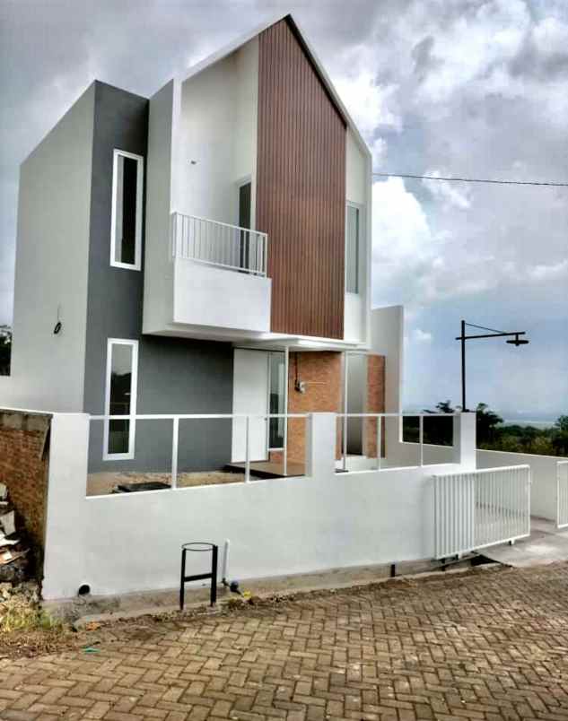 dijual rumah cluster mountana hills bringin