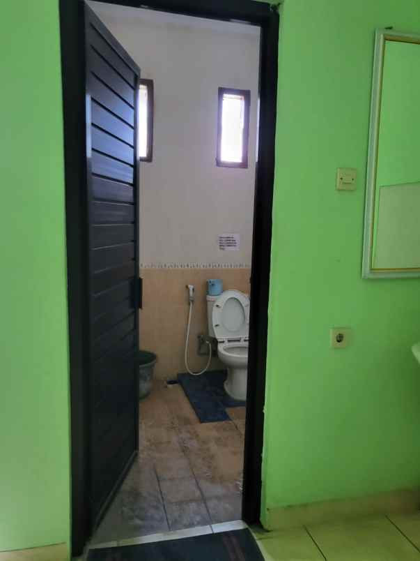 dijual rumah darmo permai