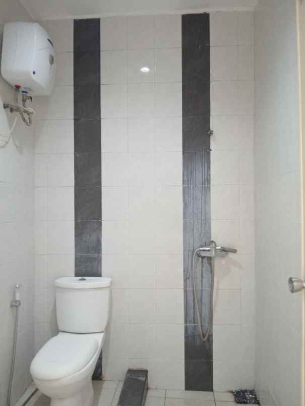 dijual rumah dharmahusada indah