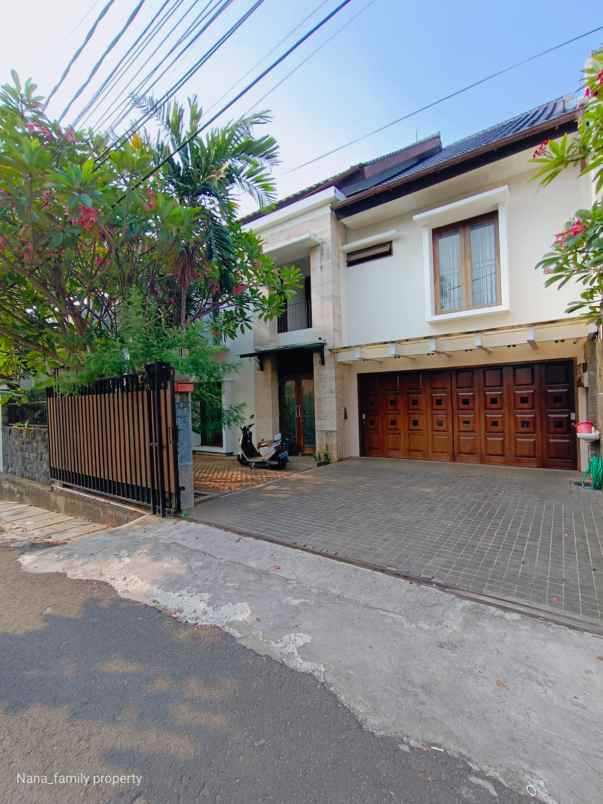 dijual rumah jalan raya permata hijau