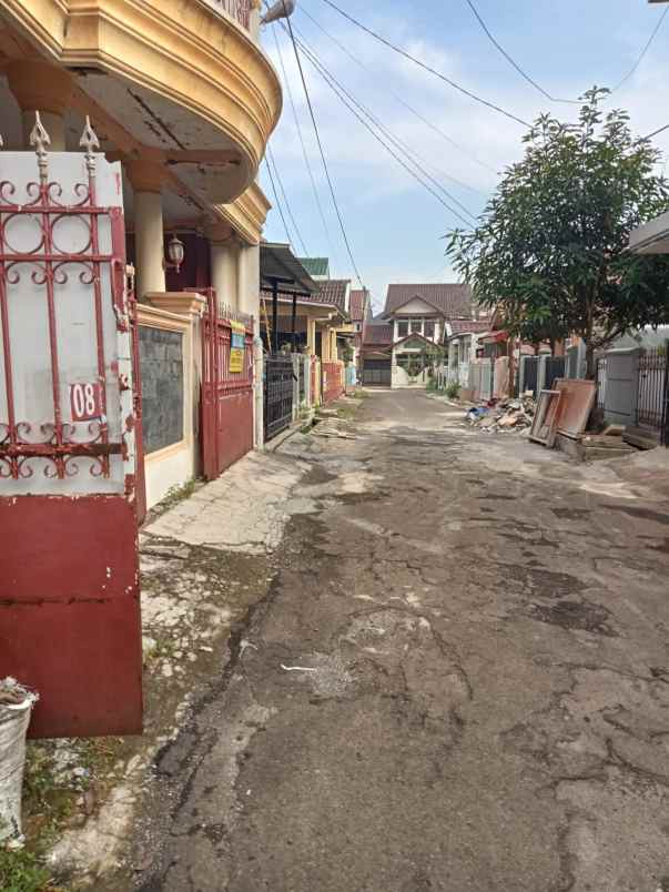 dijual rumah jl raya taman cimanggu