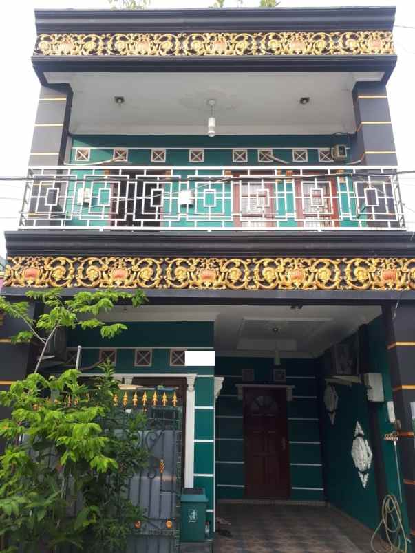 dijual rumah mutiara gading timur