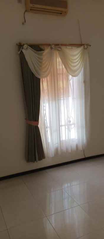 dijual rumah pakuwon city cluster taman