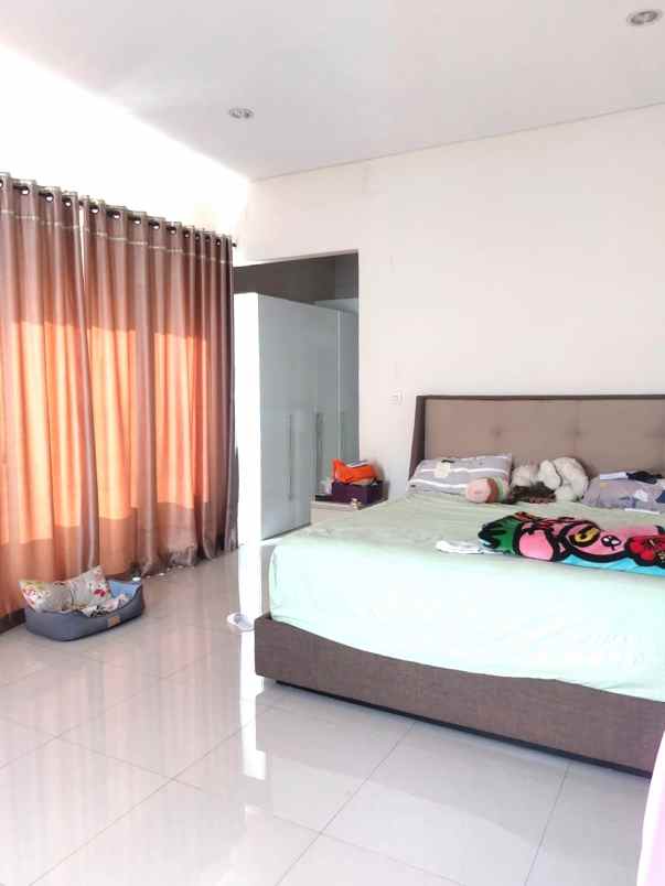 disewakan rumah cluster asia tropis