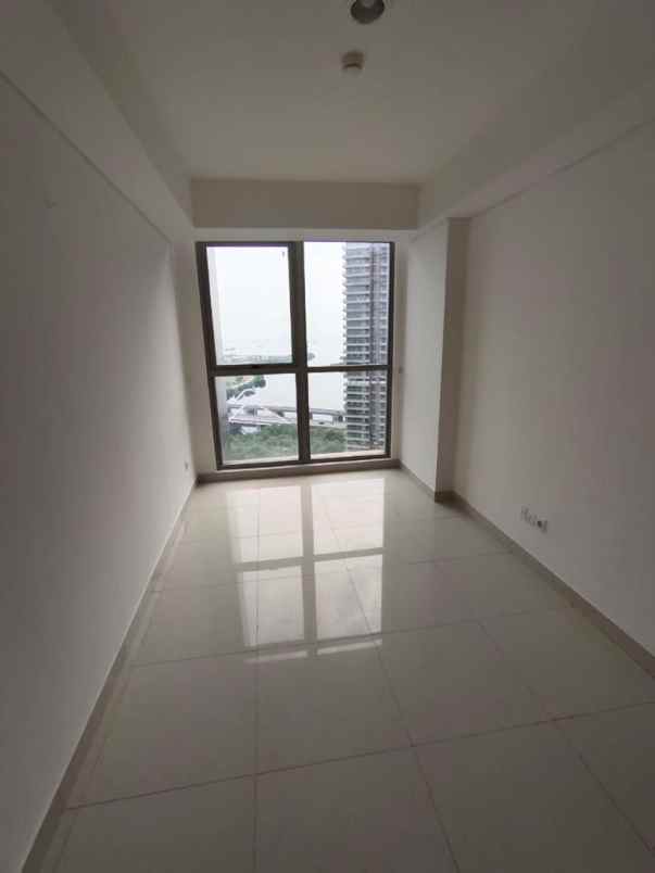 jual rugi apartement gold coast pik