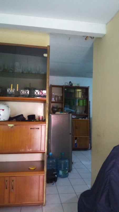 rumah 2 lantai di komplek cihanjuang shm hadap selatan