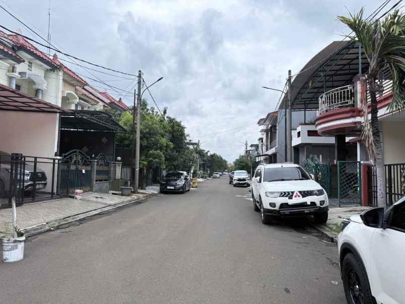 rumah cluster taman puspa kota harapan indah bekasi