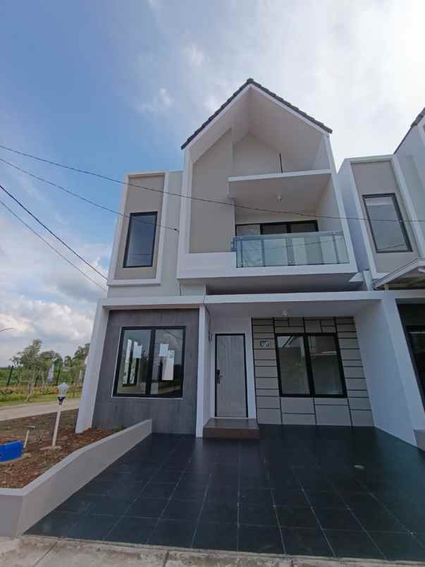 rumah minimalis sejuk dan asri di tanah baru