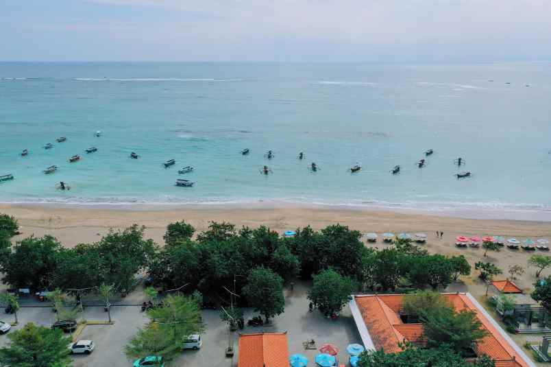 tanah view sunset bagus di pantai kuta bali