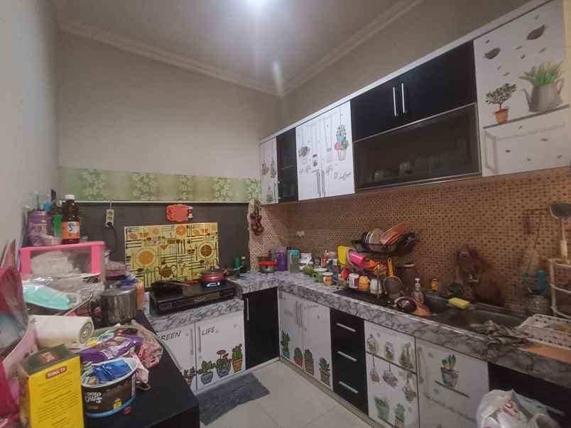 dijual rumah jl caman raya jati bening