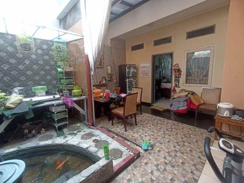 dijual rumah jl caman raya jati bening