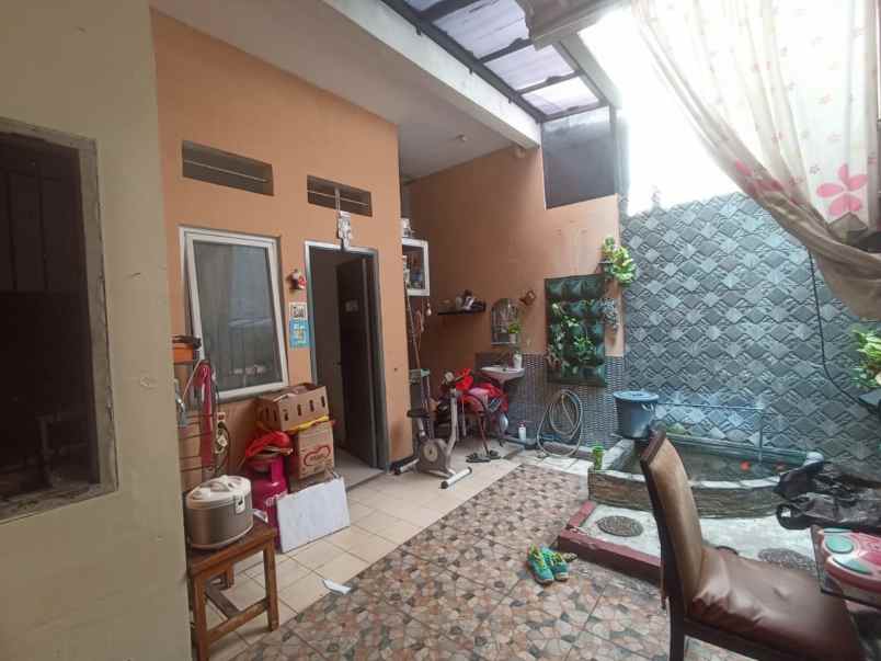 dijual rumah jl caman raya jati bening