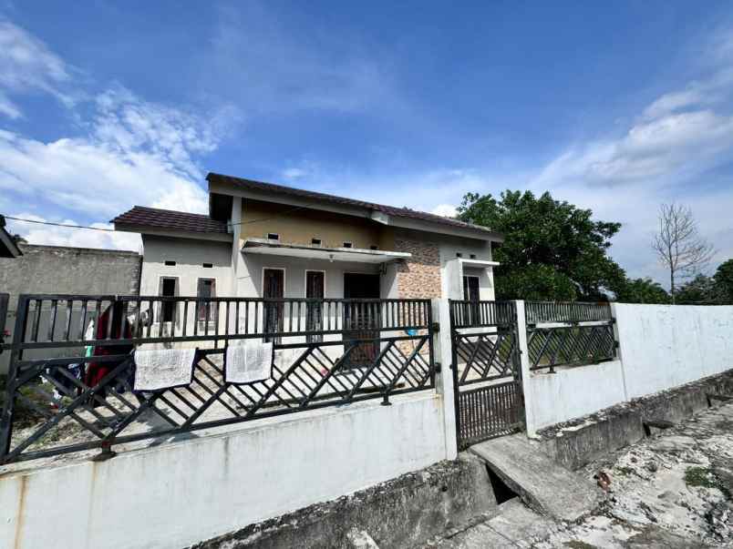 dijual rumah jl garuda sakti km 4