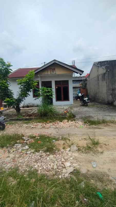 dijual rumah jl manunggal