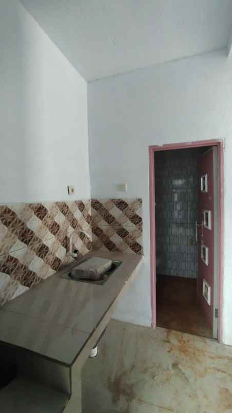 dijual rumah jln raya cibening