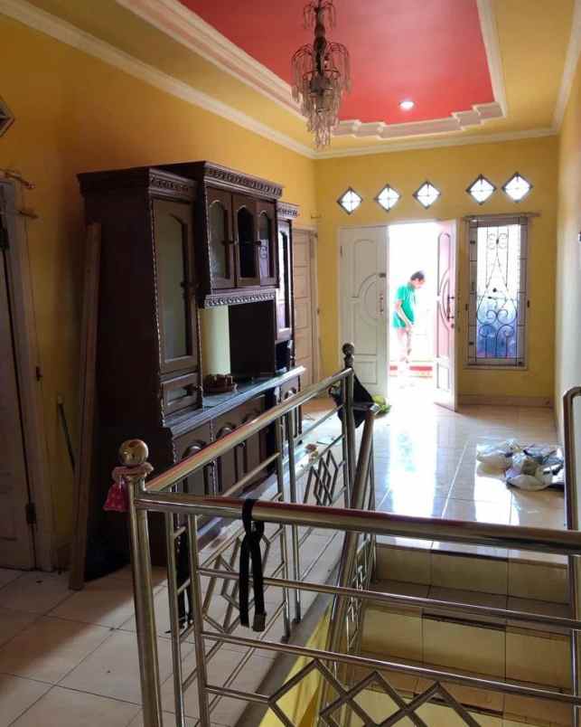 dijual rumah jln raya tapos depok