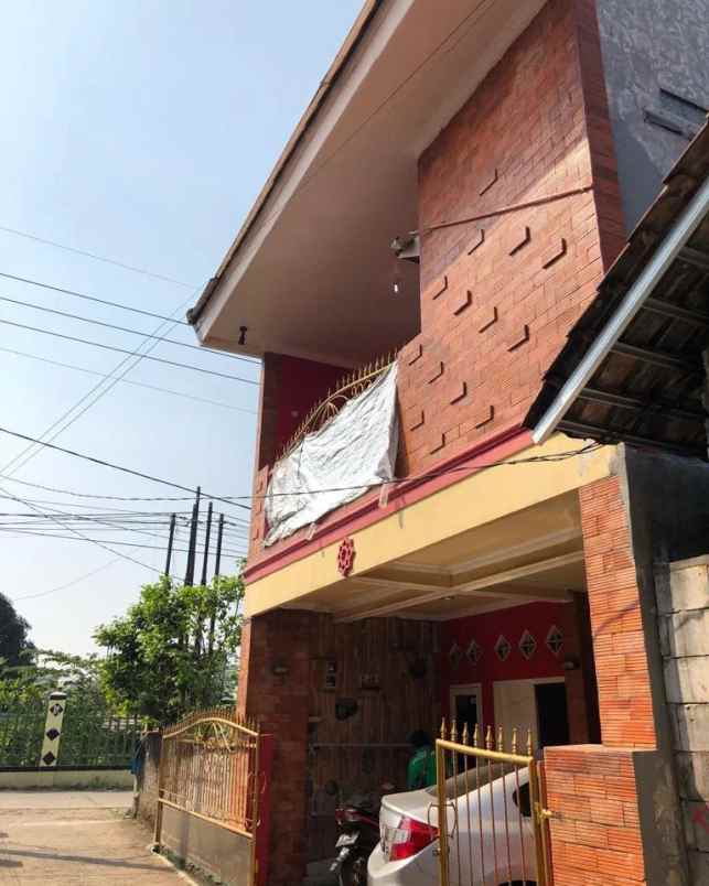 dijual rumah jln raya tapos depok