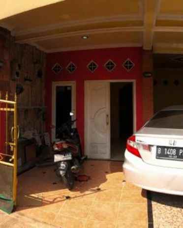 dijual rumah jln raya tapos depok