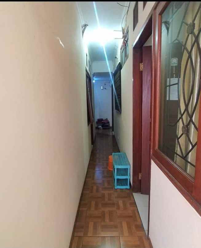 dijual rumah jln raya wolter monginsidi