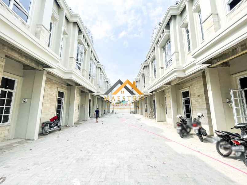 dijual rumah komplek harmoni regency