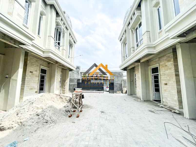 dijual rumah komplek harmoni regency