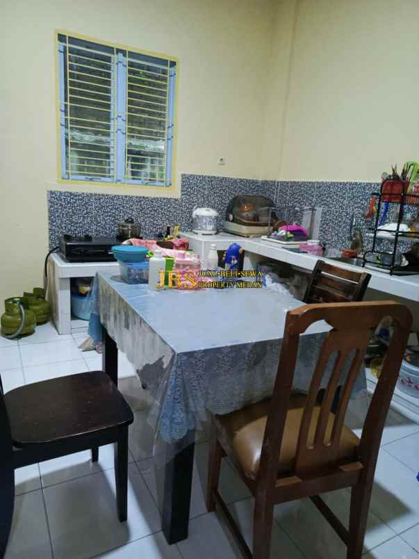 dijual rumah komplek suluh town garden