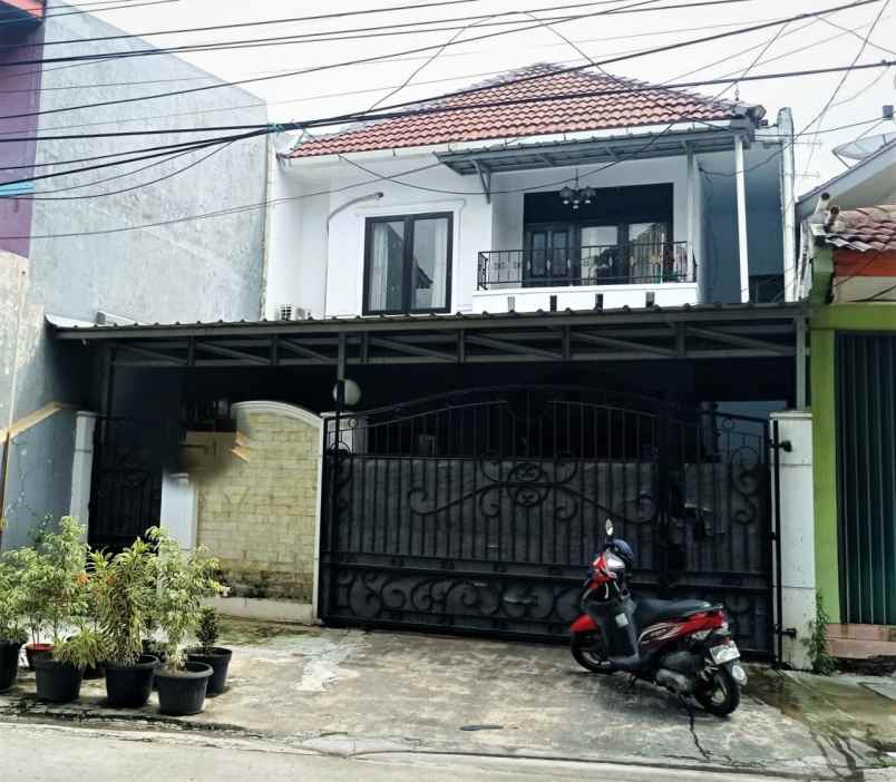 dijual rumah perumahna taman harapan