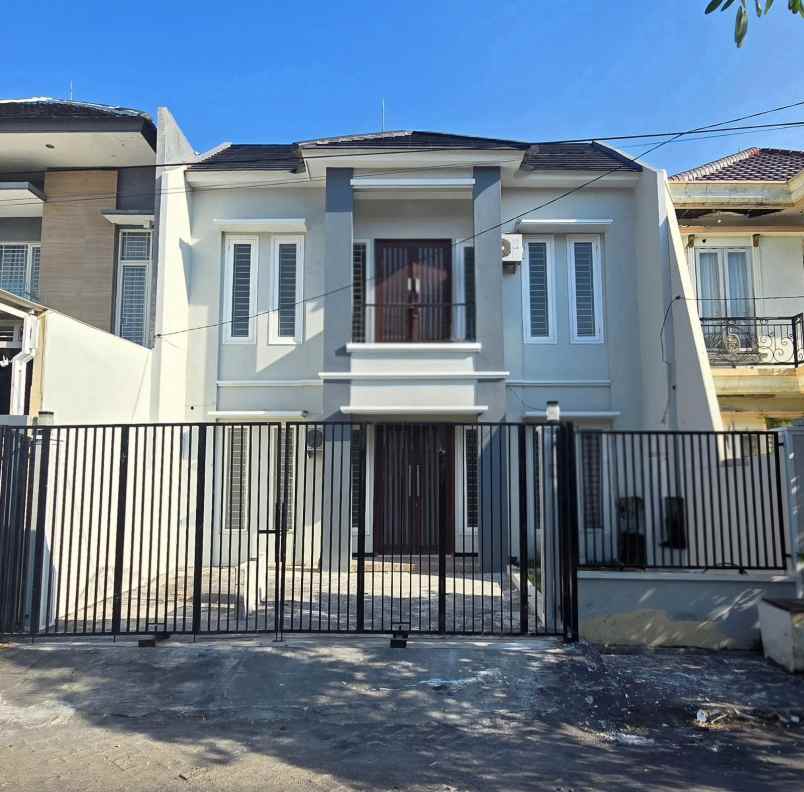 dijual rumah wiguna
