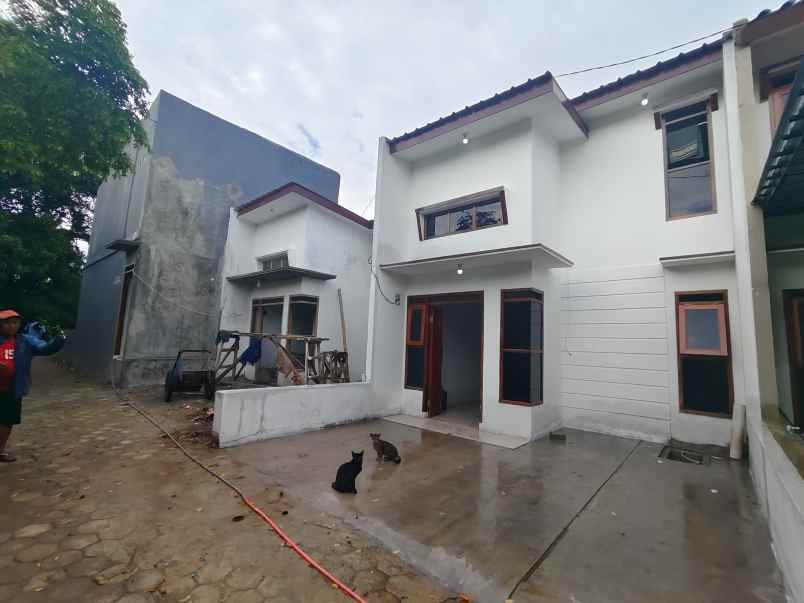 jual cash rumah 2 lantai harga promo 1 lantai