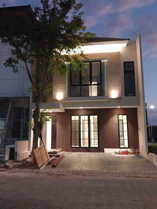 rumah grand island pakuwon city minimalis strategis