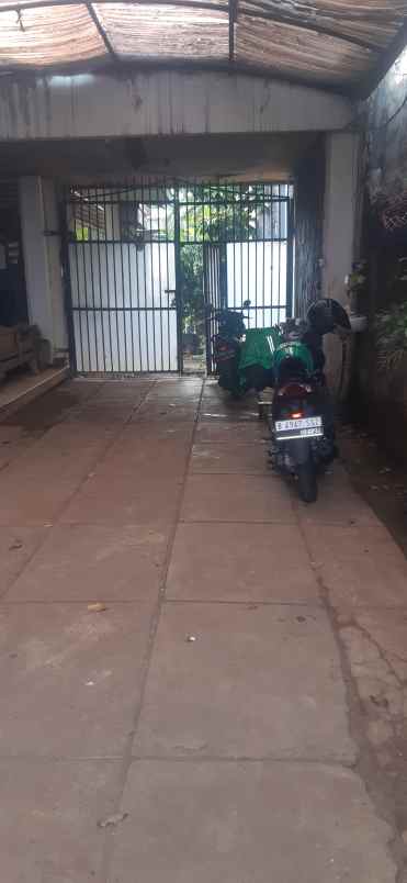 rumah pinggir jalan akses 2 mobil