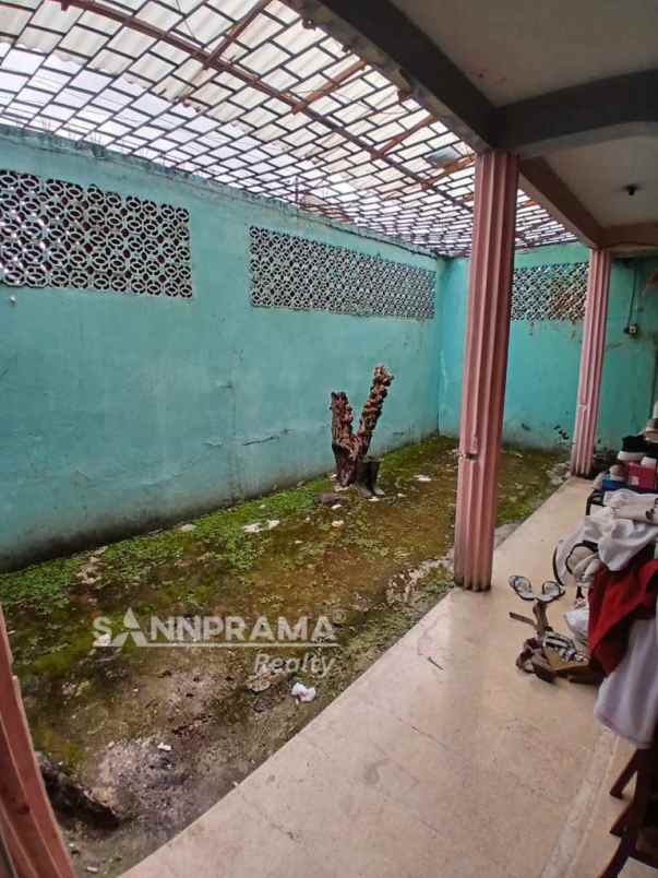 rumah second hook luas di perumnas beji rilin