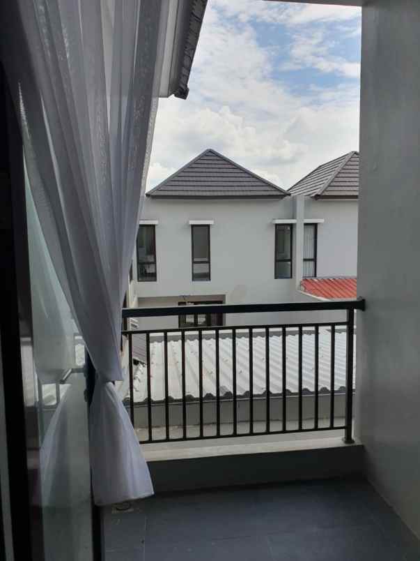 rumah siap huni di cluster cherryville grand wisata