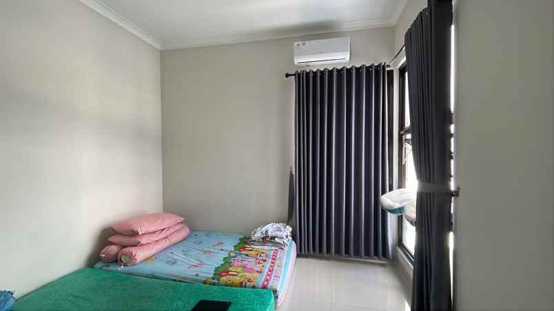 rumah siap huni di cluster cherryville grand wisata
