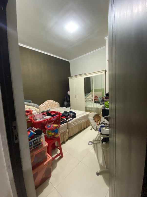 rumah sutorejo utara row 3 mobil